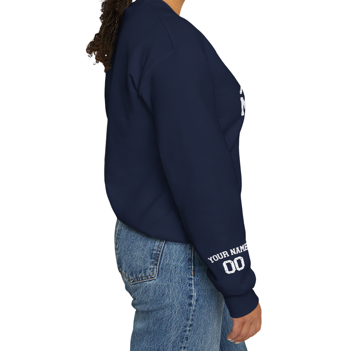 Person wearing a navy sweatshirt with text on sleeves against a white background
