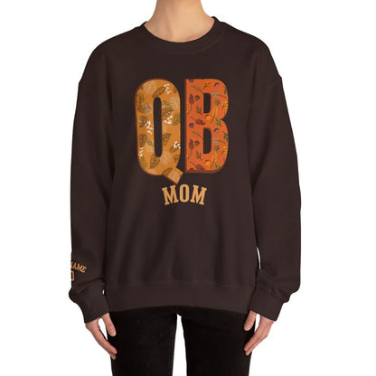 Woman Wearing Black QB Mom Sweatshirt with Personalized Sleeve Detail
