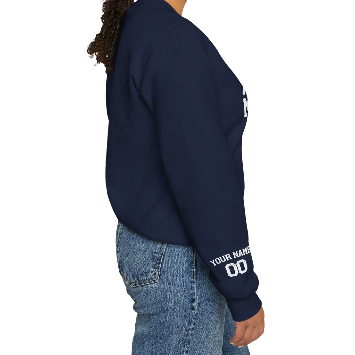 Person wearing a navy sweatshirt with text on sleeves against a white background
